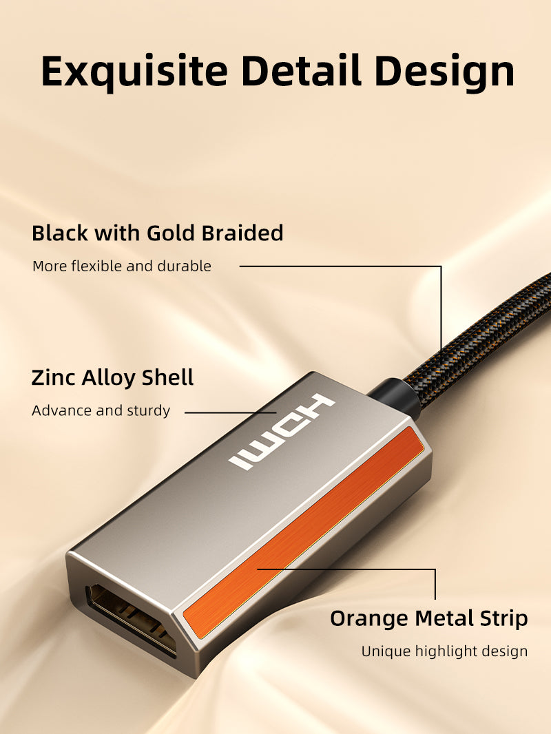 Close-up of USB-C to HDMI 2.1 adapter with zinc alloy shell, orange metal strip, and black braided cable for durability