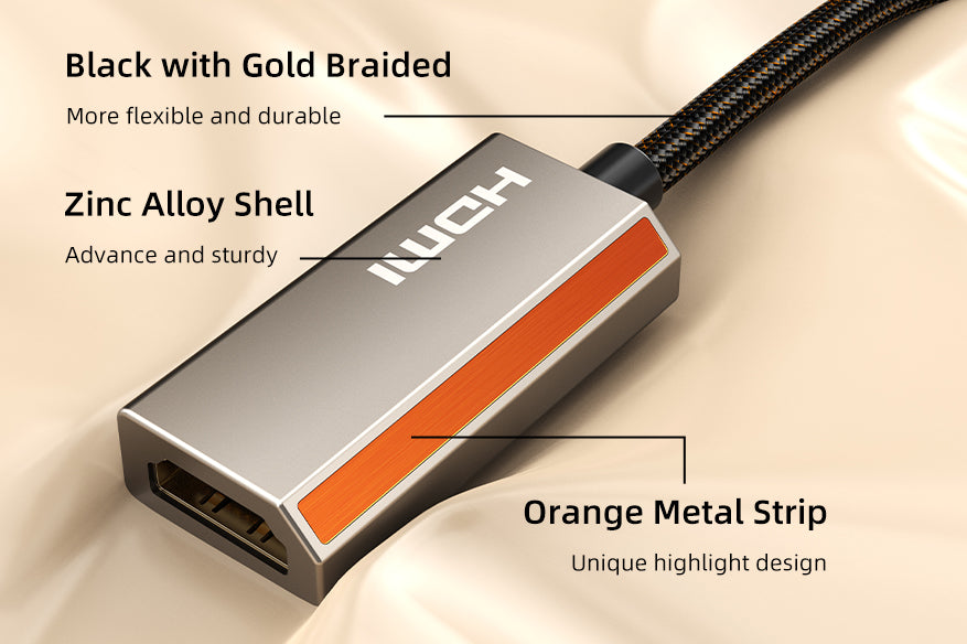 Close-up of USB-C to HDMI 2.1 adapter showing zinc alloy shell, orange metal strip, and black braided cable design for durability