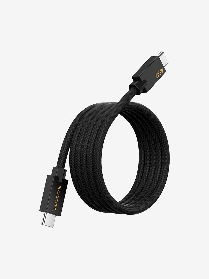Black coiled magnetic USB4 USB-C to USB-C charging cable with gold-printed connectors, supporting 240W USB4 fast charging and high-speed data transfer