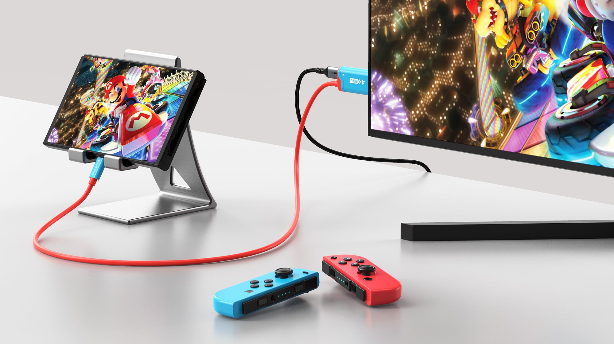 Nintendo Switch connected to TV with Cabletime USB-C to HDMI 4K60Hz adapter cable and Joy-Con controllers on desk

